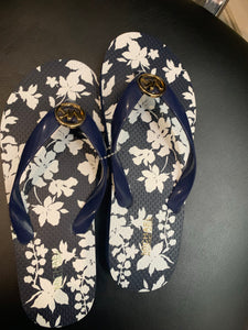 MK Navy floral flip flops